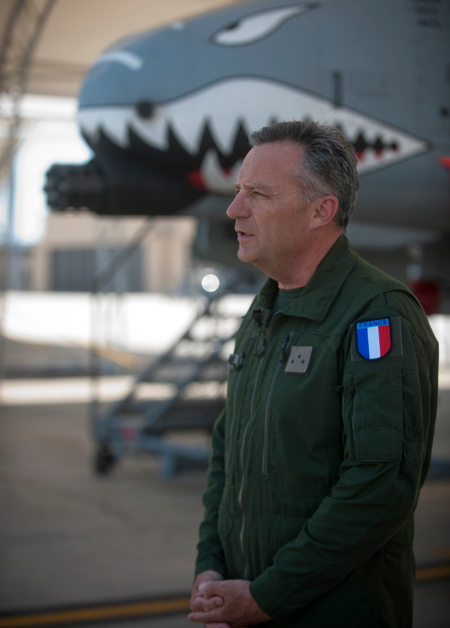 MOODY AIR FORCE BASE, Ga.--  Général de Division Aérienne (Maj. Gen.) Gratien Maire, French defense attaché to the U.S., answers questions during a broadcast interview during a base visit June 2. During the interview, General Maire explained the benefits of the officer exchange program: "It's great for the service members to know each other as much as possible because you'll never know when you'll have to work together." (U.S. Air Force photo/Airman 1st Class Joshua Green)(RELEASED)
 
