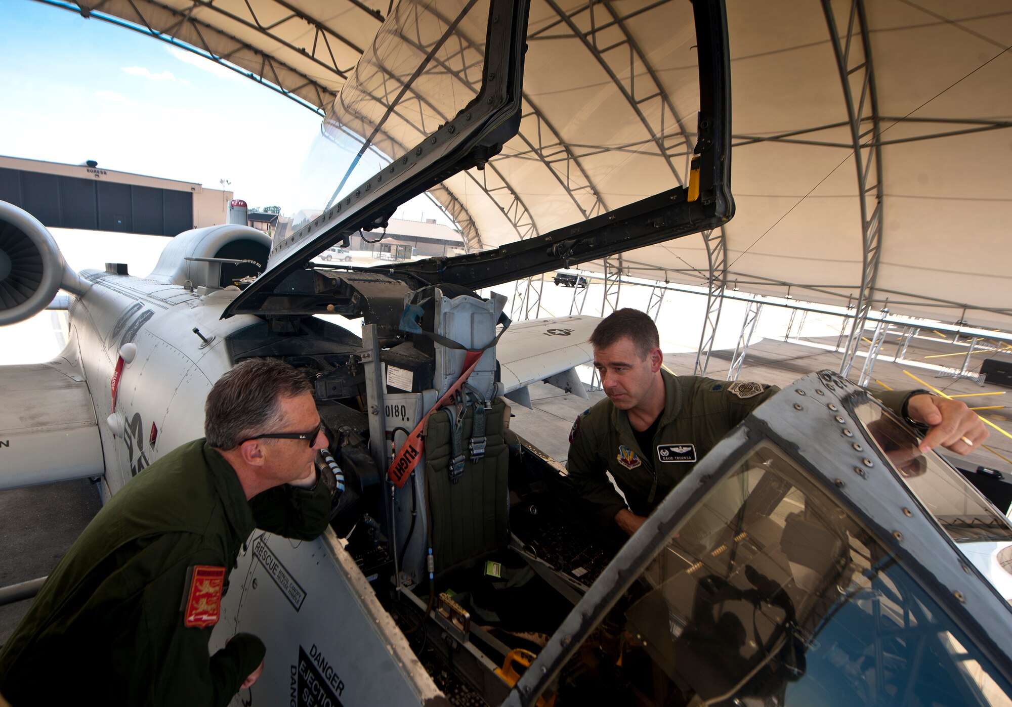 MOODY AIR FORCE BASE, Ga.--  Lt. Col. David Trucksa, 75th Fighter Squadron commander, gives Général de Division Aérienne (Maj. Gen.) Gratien Maire, French defense attaché to the U.S., an up-close look at an A-10C Thunderbolt II during a base visit June 2. Colonel Trucksa explained some of the controls and components on the A-10 and compared it to the French Mirage 2000D. (U.S. Air Force photo/Airman 1st Class Joshua Green)(RELEASED)
 
