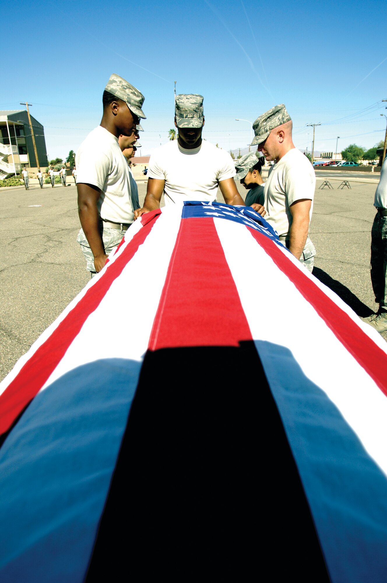 Members of the Luke Air Force Base Honor Guard prepare to move a casket May 31 during a burial ceremony practice.  A primary role for honor guards in the United States and some other countries is to provide funeral honors for fallen comrades and to guard national monuments.  (U.S. Air Force photo by Staff Sgt. Jason Colbert)