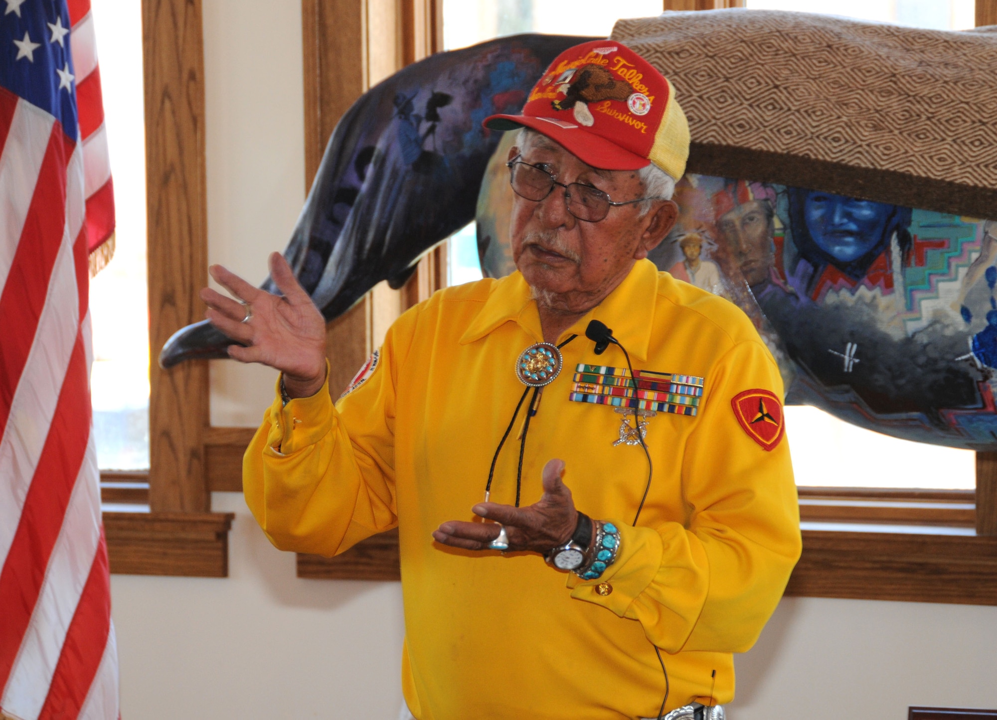 Bill Toledo, an original Navajo "Code-Talker" from World War II, speaks about his experiences during the war, to members of the 113th Civil Engineer Squadron (113 CES), District of Columbia Air National Guard, in Gallup, N.M., June 2, 2011.  The 113th CES members are in Gallup and Window Rock, Ariz., as part of the Innovative Readiness Training, a civil-military affairs program linking military units with civilian communities for humanitarian projects.  (U.S. Air Force Photo by Tech Sgt. Craig Clapper)   