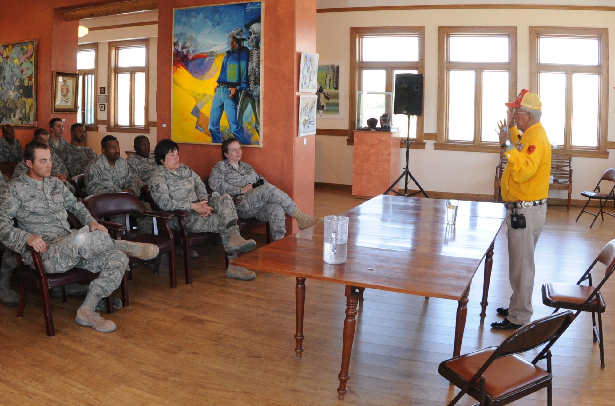 Bill Toledo, an original Navajo "Code-Talker" from World War II, speaks about his experiences during the war, to members of the 113th Civil Engineer Squadron (113 CES), District of Columbia Air National Guard, in Gallup, N.M., June 2, 2011.  The 113th CES members are in Window Rock, Ariz., as part of the Innovative Readiness Training, a civil-military affairs program linking military units with civilian communities for humanitarian projects.  (U.S. Air Force Photo by Tech Sgt. Craig Clapper)   