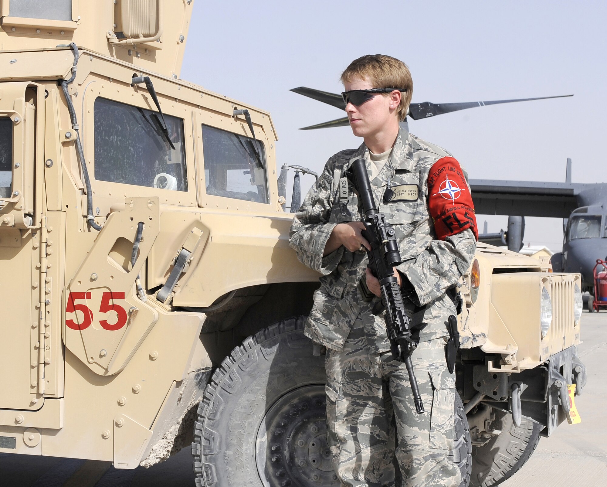 Staff Sgt. Alicia Estes posts security June 3, 2011, at Kandahar Airfield, Afghanistan. Airmen being assigned to a security post could be the result of a distinguished visitor, in-flight emergency, ground emergency or a number of other events calling for this mission requirement.Sergeant Estes is a security forces Airman assigned to 466th Air Expeditionary Wing Flight Line Security. (U.S. Air Force photo by Senior Airman Willard E. Grande II)