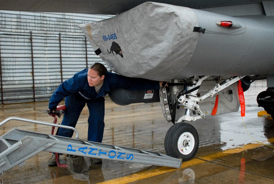 KWANGJU AIR BASE, Republic of Korea -- Senior Airman Kathleen Brophy, 8th Aircraft Maintenance Squadron crew chief assigned to the 35th Aircraft Maintenance Unit, prepares an F-16 Fighting Falcon for flight at Max Thunder 11-1 here May 26. The exercise gave peninsula Airmen an opportunity to sharpen their ability to work together in a simulated war-time environment. (U.S. Air Force photo/Senior Airman Benjamin Stratton)