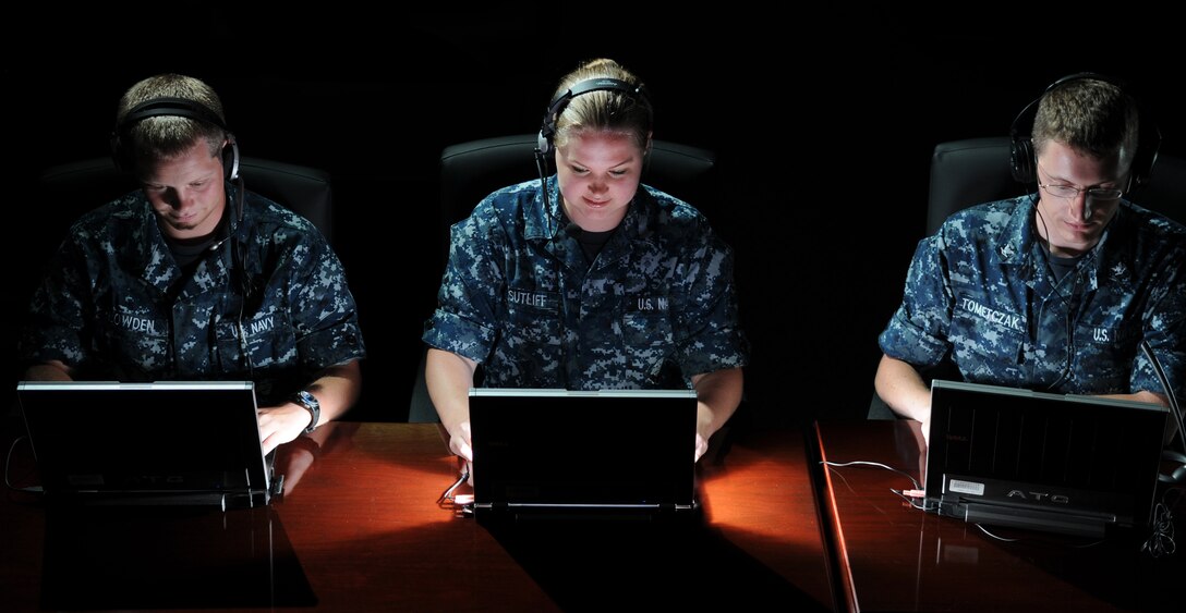Navy Seaman Recruit Ben Lowden, left, Seaman Apprentice Alicia Sutliff and Petty Officer 3rd Class Steven Tometczak, cryptologic technician students at the Center for Information Dominance Corry Station, preview the Integrated System for Language Education and Training, May 24, 2011. The Navy is testing the program for Language, Regional Expertise and Culture and the Academic Consortium for Global Education. U.S. Navy photo by Gary Nichols