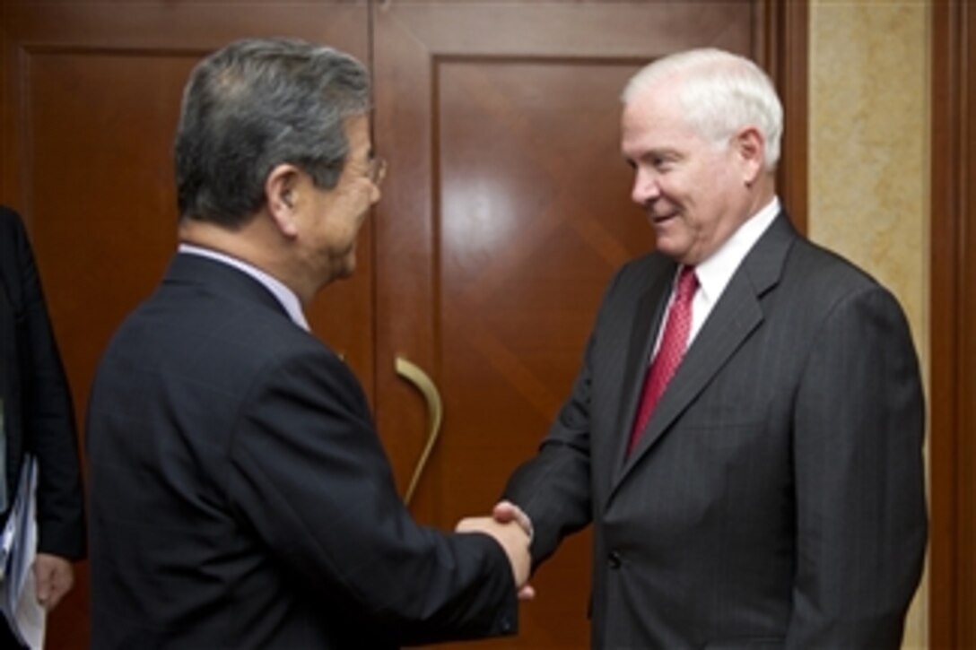 Secretary of Defense Robert M. Gates meets with Japanese Defense Minister Toshimi Kitazawa at the Shangri-La Hotel in Singapore during the 10th International Institute for Strategic Studies Asia Security Summit on June 3, 2011.  