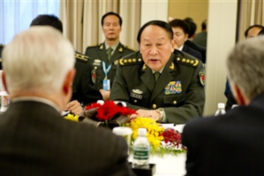 Chinese Defense Minister Gen. Liang Guanglie meets with Secretary of Defense Robert M. Gates at the Shangri-La Hotel in Singapore during the 10th International Institute for Strategic Studies Asia Security Summit on June 3, 2011.  