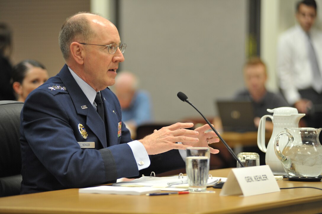 Gen C. Robert Kehler, commander, U.S. Strategic Command, testifies before Nebraska Senator Ben Nelson during a Senate Armed Services Subcommittee Field Hearing on Strategic Forces at the Bellevue Welcome Center in Bellevue, Neb., on June 3, 2011.