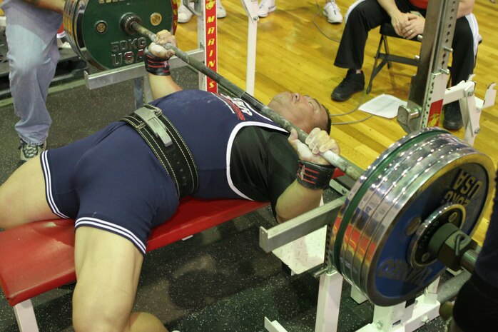 Shuji Goto prepares to lift 579 pounds during the 2011 Summer Slam Open Bench Press Challenge at the IronWorks Gym sports courts here Saturday. Goto went on to win overall in the men’s division with 579 pounds. Steve C. Robinson Jr. placed second with 529 pounds. Akihiko Mato placed third with 375 pounds. The bench press challenge is one of several annual Semper Fit sponsored strength events. The 2011 Far East Powerlifting meet is the next event scheduled for later this year.