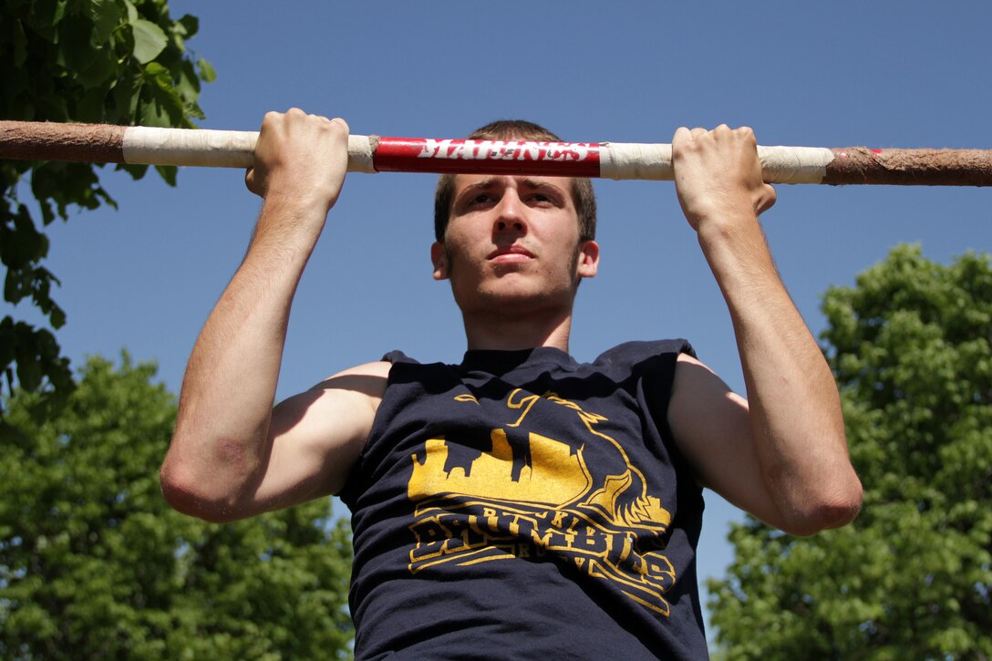 A member of the Brooklyn Brumbies Rugby Club takes the pull-up challenge while attending the Minnesota Amateur Rugby Foundation Tournament June 4 at the National Sports Center. For additional imagery from the event, visit www.facebook.com/rstwincities.