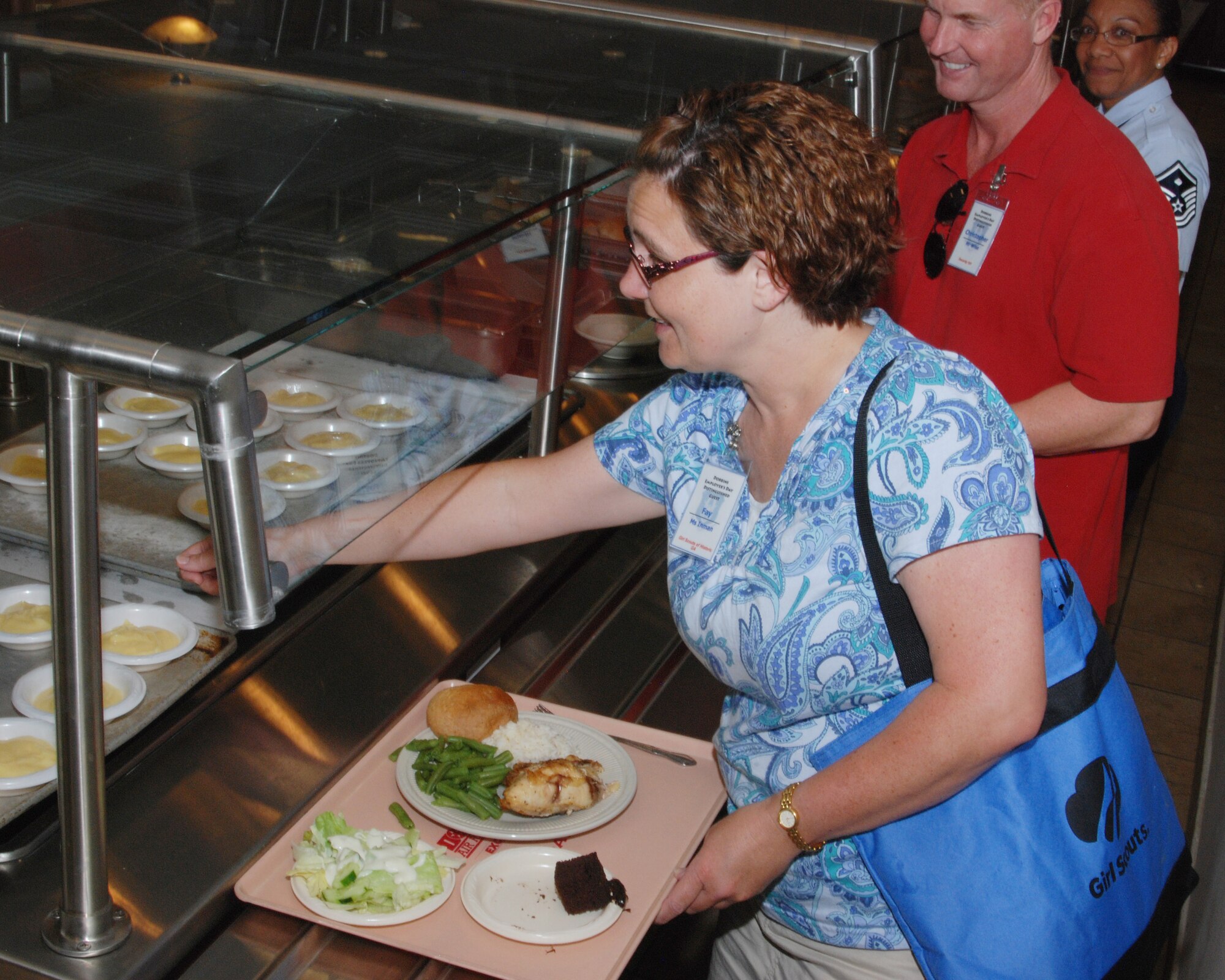 Ms. Faye Inman chooses a dessert select at the Dobbins Consolidated Club during her visit as a  employer on Employers Appreciation Day at Dobbins Air Reserve Base.  Twenty-two employers took the opportunity to see what their employee/reservist's 94th Airlift Wing experience was all about.  (U.S. Air Force photo/Master Sgt. Stan Coleman)