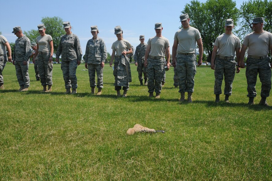 Members of the 115 Force Support Squadron, take part in a search and recovery training exercise at Truax Field, Madison, Wis., June 6, 2011. Search and recovery training allows for team members to communicate with each other more effectively and prepares them for a deployed location. (U.S. Air Force photo by Tech Sgt. Ashley Bell) 