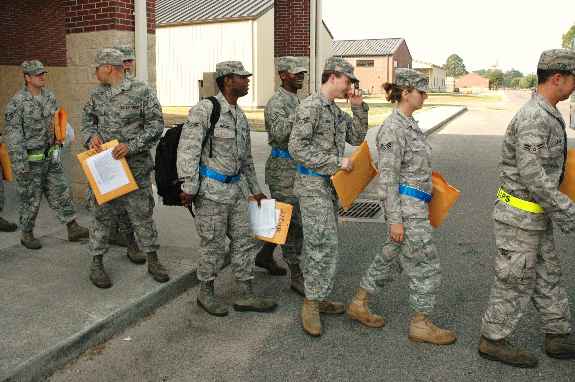 Airmen of the 315th Airlift Wing enjoy a minute of camaraderie and laughter as they board a bus during an operational readiness mobility exercise on June 4, 2011 at Joint Base Charleston, S.C. The mobility exercise evaluates operational readiness for airmen assigned to Joint Base Charleston, S.C.