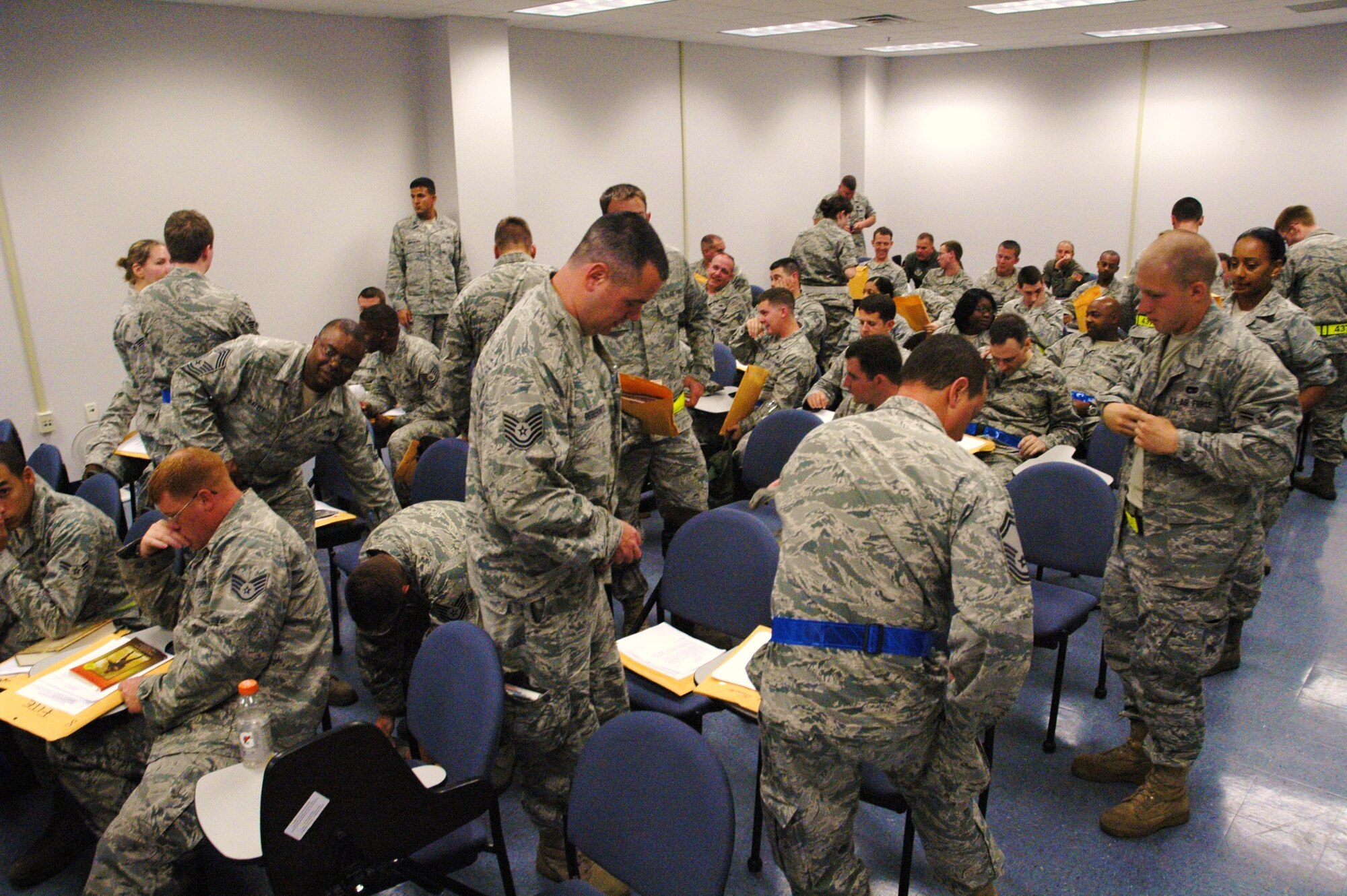 Airmen of the 315th Airlift Wing and the 628th Airlift Wing gather before a briefing during an operational readiness exercise on June 4, 2011 at Joint Base Charleston, S.C. The exercise is designed to train airmen in operational readiness for real world deployments.