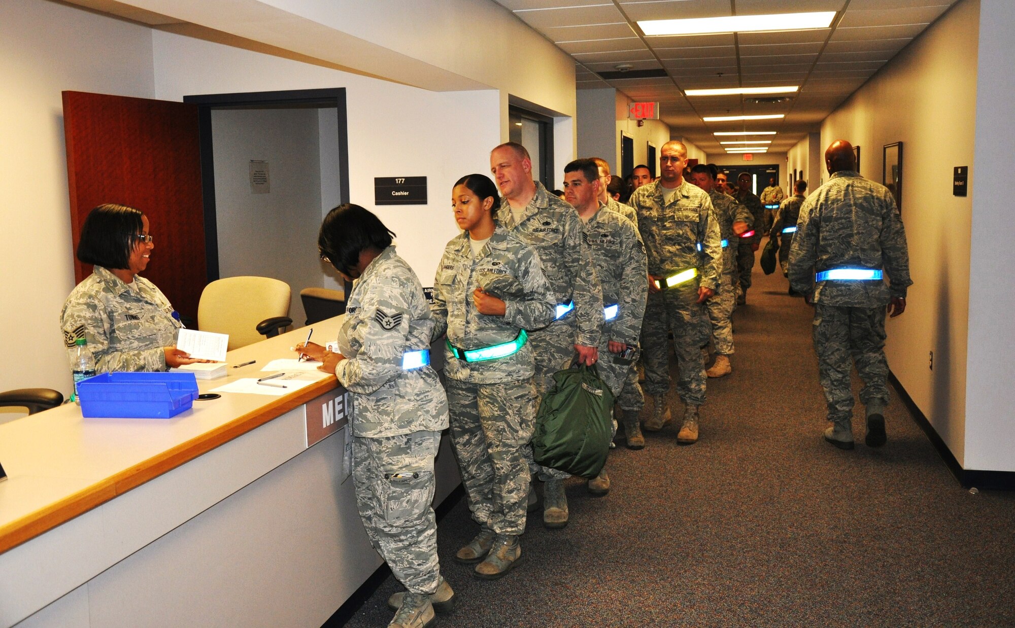 Airmen of the 315th Airlift Wing and the 628th Airlift Wing line up to sign in during a mobility exercise on June 4, 2011 at Joint Base Charleston, S.C. The mobility exercise explores the operational readiness capabilities of airmen as they prepare for deployment.