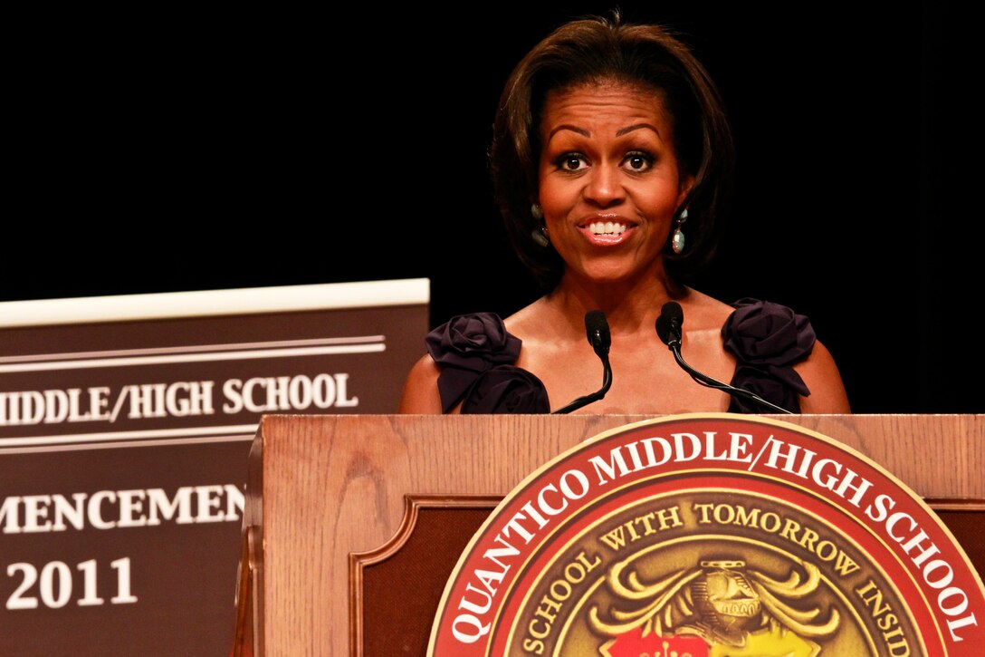 First Lady Michelle Obama gives the commencement address at Quantico Middle/High School on Marine Corps Base Quantico, Va., June 3, 2011. She congratulated the students and told them: "We are all so very proud of you!"