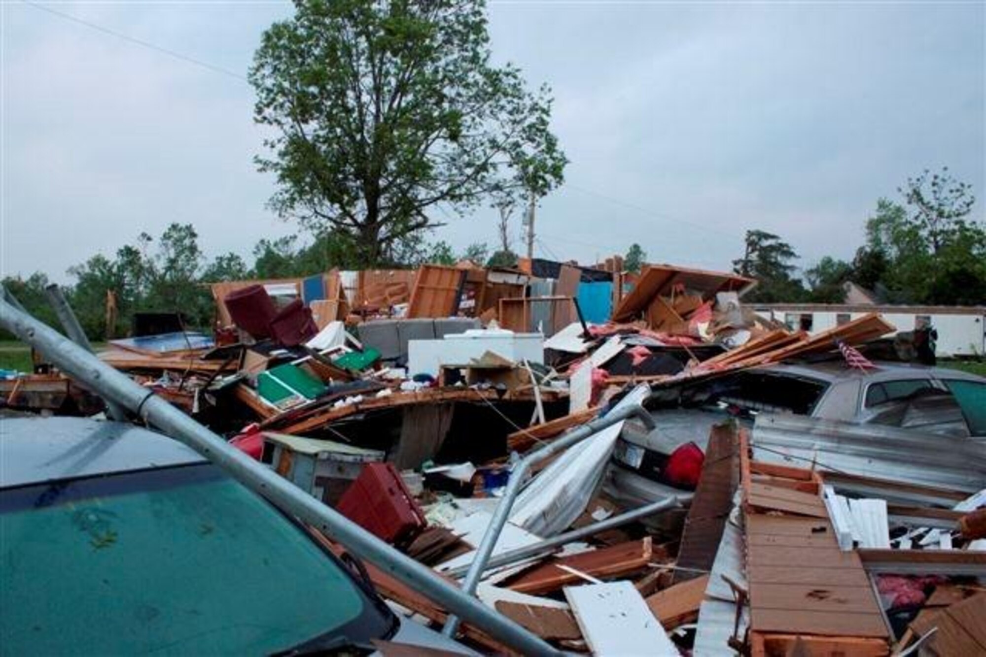 The remains of Master Sgt. Jeffrey Norling’s house, which now sits on his KHP patrol car. (photo by Lt. Richard Mahoney - KHP)
