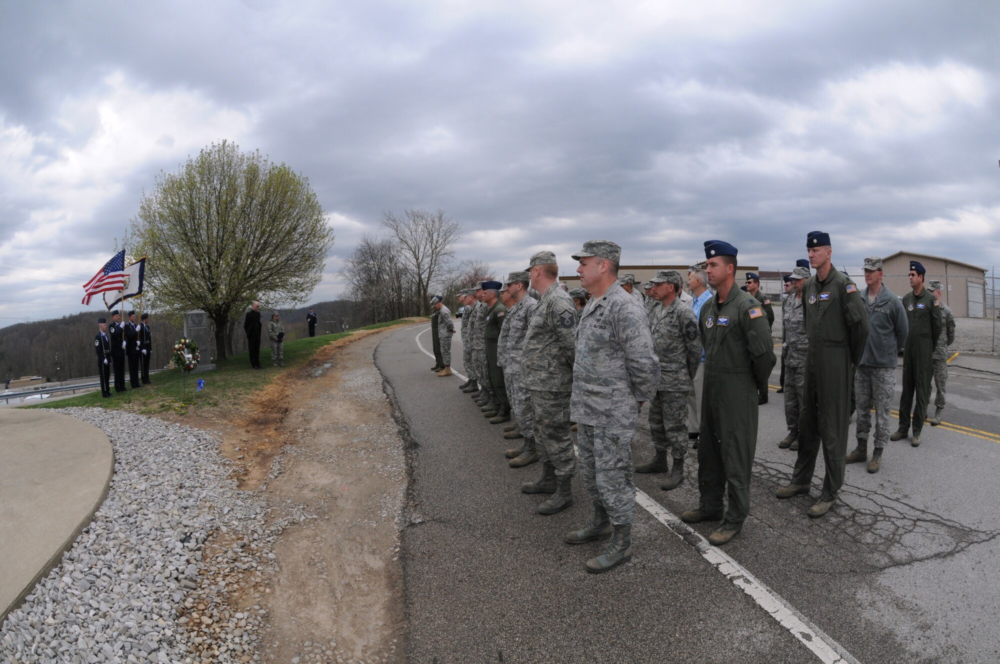 Members of the 130th Airlift Wing, Charleston, W.Va. memorialize the 60th anniversary of the C-47B Skytrain cargo plane crash that claimed 21 lives. The accident remains the worst in the history of the West Virginia Air National Guard. (U.S. Air Force photo by Tech. Sgt. Eugene R. Crist)