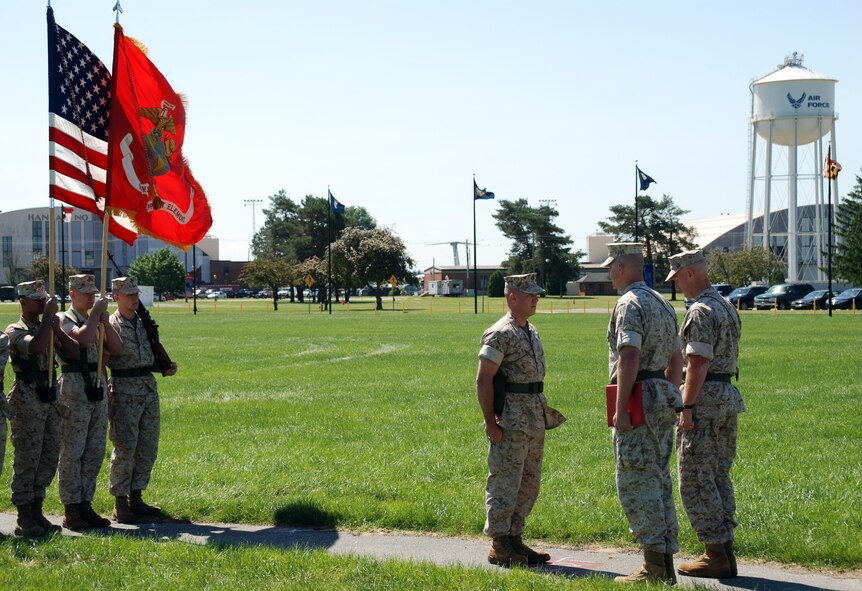 Westover Marines participated in a change of command ceremony located on the base ellipse June 3. Lt. Col. David G. McCulloh relinquished command to Maj. Robert A Hubbard. ?The transfer of unit color signifies the passing of responsibility, authority, accountability and command from one commanding officer to the incoming commanding officer," according to the Marine Unit. 