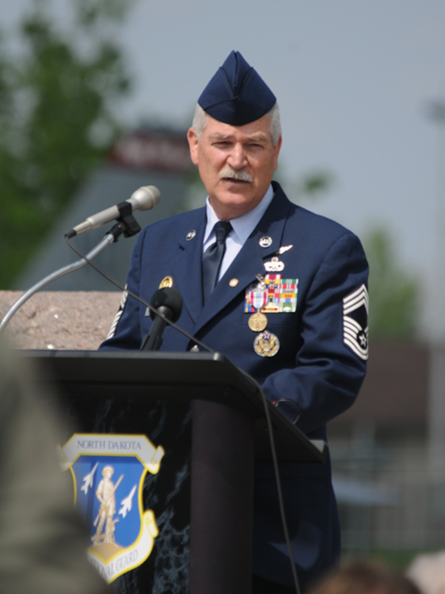 Chief Master Sgt. James Clemenson speaks June 4, during his retirement ceremony at the North Dakota Air National Guard, Fargo, N.D. Clemenson is the 
last enlisted Airman to have been stationed in Vietnam to retire from the Air 
Force.  Clemenson did two tours in Vietnam with the U.S. Army from October 1970 through April 1972. He joined the North Dakota Air National Guard in 1973 and has most recently served as the National Guard Bureau senior enlisted manager for the joint staff, Washington, D.C. He has served in the United States military for 41 years. Only one other active Airman, Chief Master Sgt. Jim Honeycutt, still remains in service that wears a Vietnam Service Ribbon, although it's for temporary duty in country versus a mobilization. Clemenson and Honeycutt's status is among active-duty Airmen and does not include drill status Guardsmen, on which no clear statistics were available.