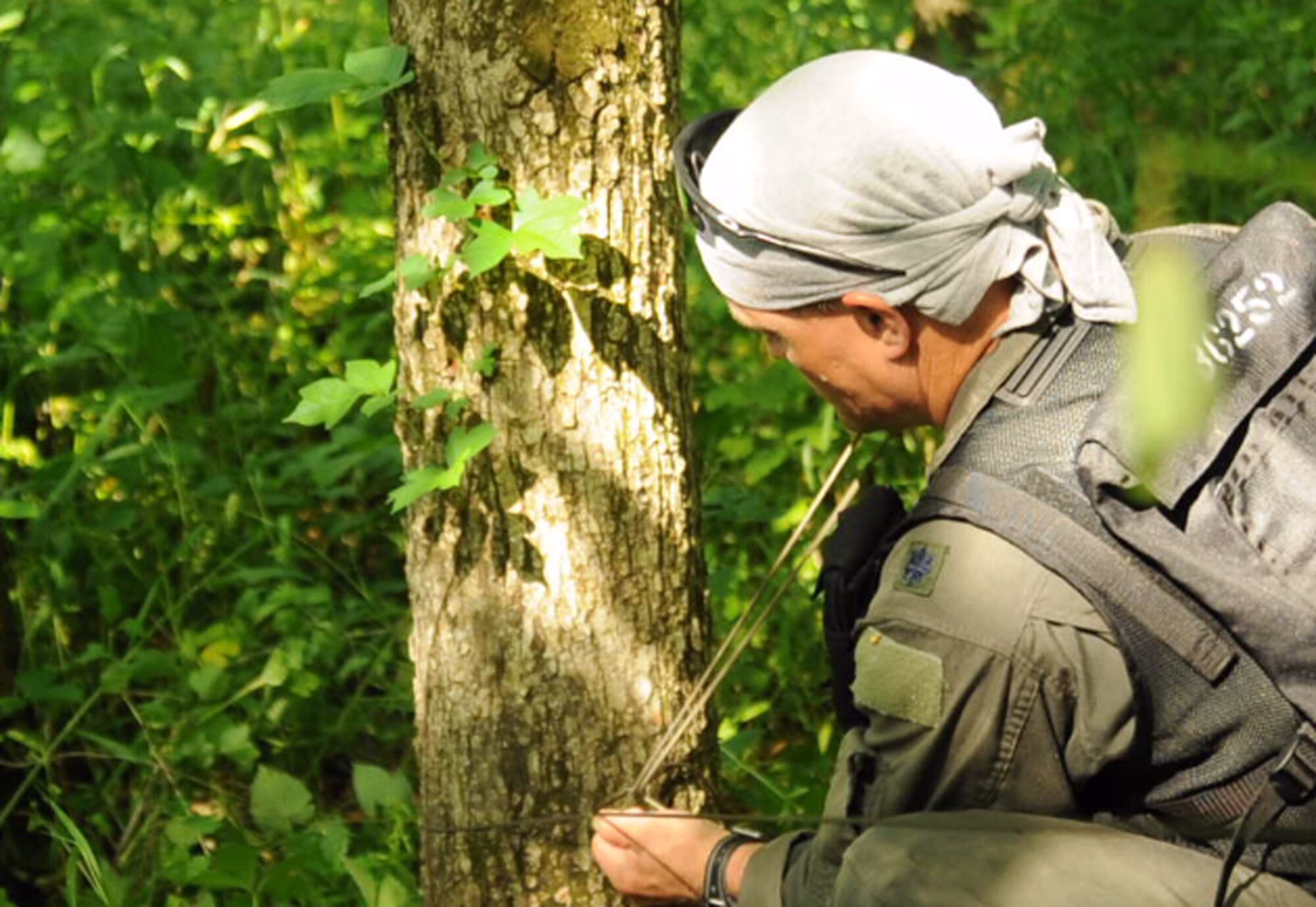 Members of the 180th Airlift Squadron, 139th Airlift Wing, Missouri Air National Guard, participate in survival training in Northern Missouri June 4, 2011. (U.S. Air Force photo by Senior Airman Sheldon Thompson/RELEASED)