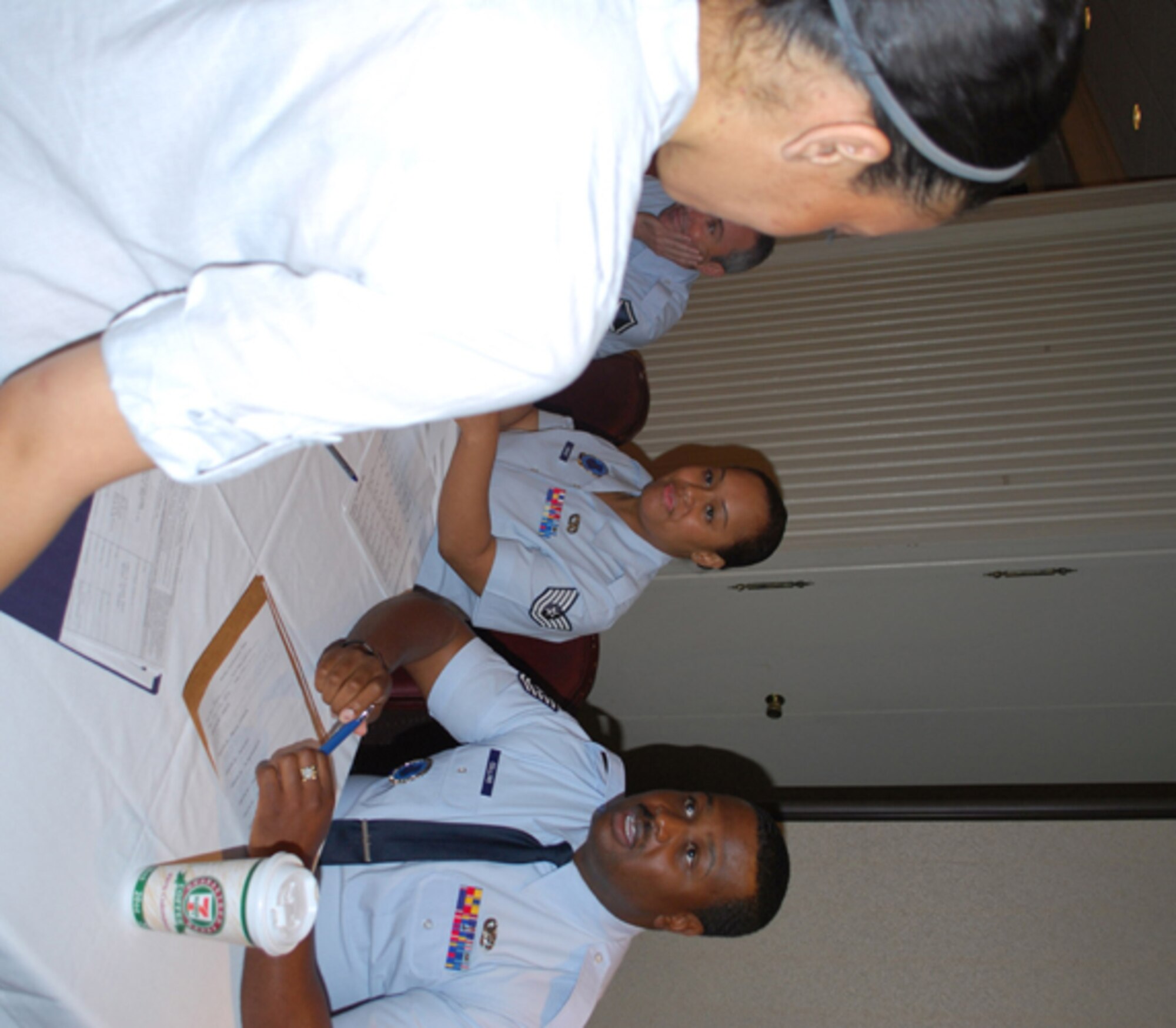 507th Air Refueling recuiters discuss career opportunities with participants of the Individual Ready Reserve muster on Saturday, June 4 2011. 