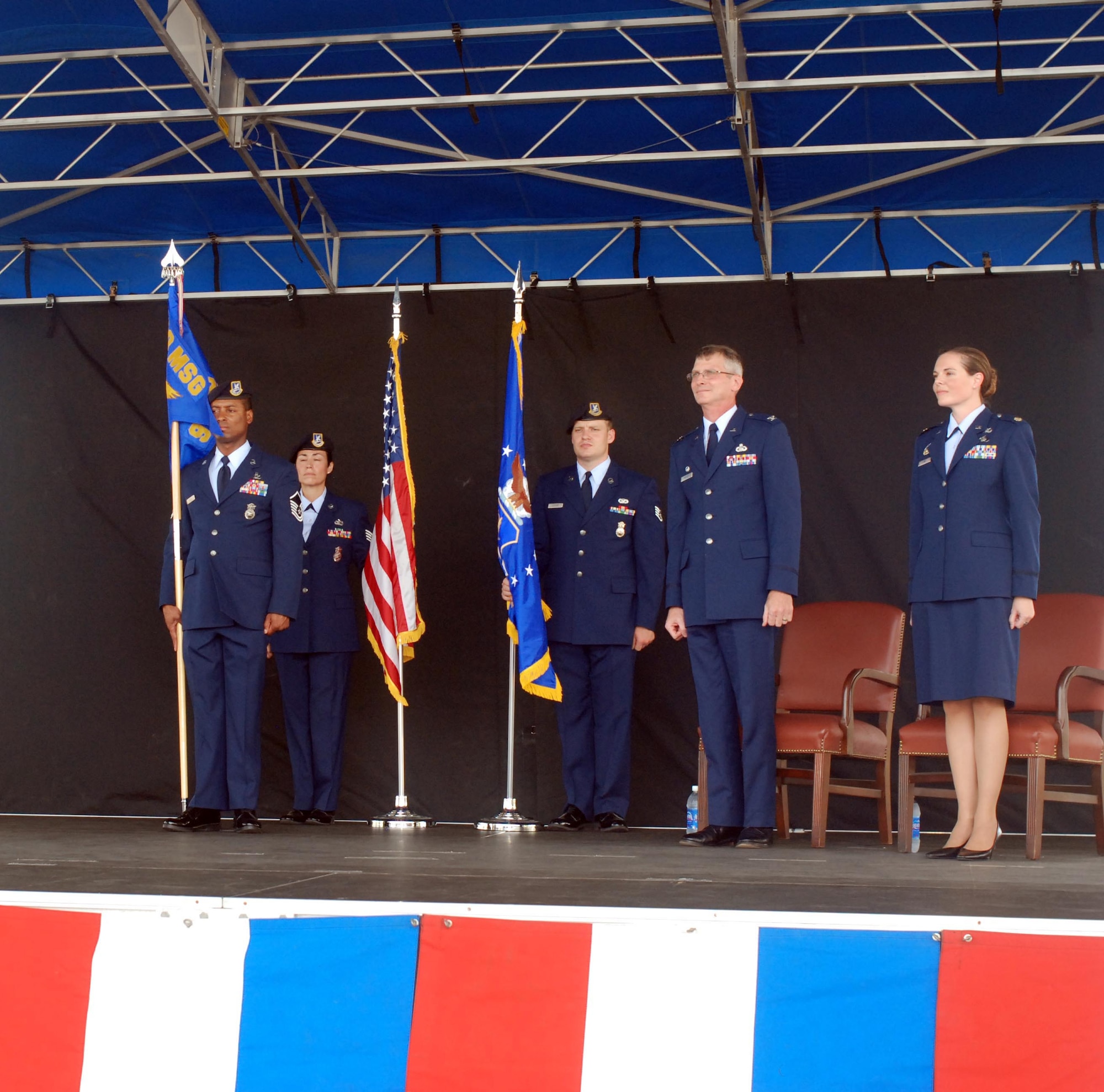PATRICK AIR FORCE BASE, Fla - Col. George Raeder, left, presides over the 920th Security Forces Squadron Assumption of Command. With the words "I assume command" Maj. Molly Long became the first commander for the newest squadron of the 920th Rescue Wing. (U.S. Air Force Photo/Capt. Ryan Liss)