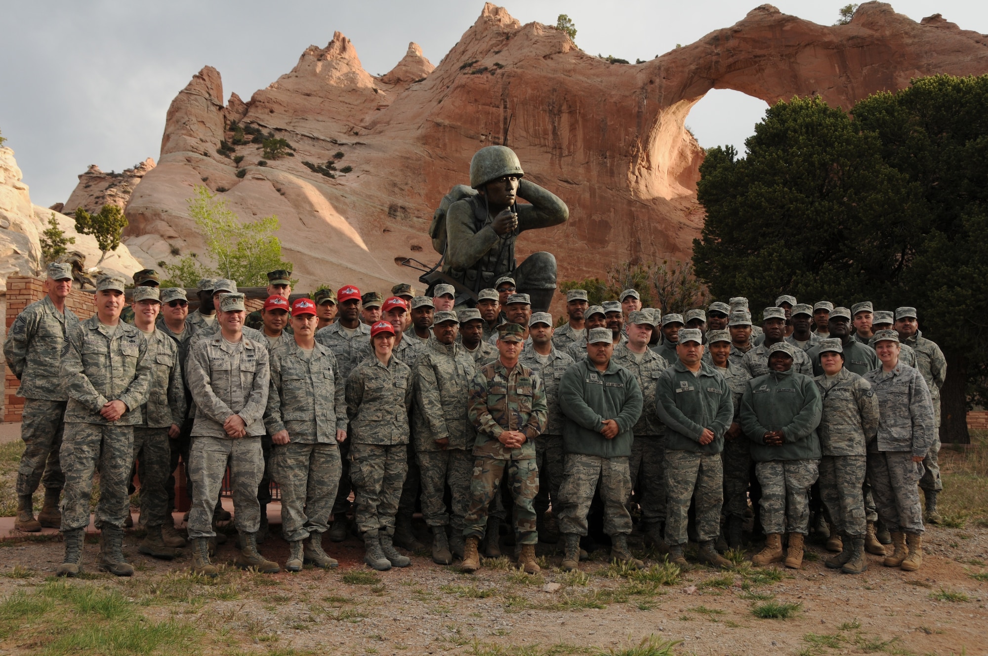 Members of the 113th DC ANG Civil Engineer Squadron assemble for a group shot at the Navajo Code Talkers Memorial, Window Rock, Ariz, May24, 2011 . Members of the 113th CES are in Window Rock, Az., as part of the Innovative Readiness Training, a civil-military affairs program linking military units with civilian communities for humanitarian projects. (U.S. Air Force Photo by Master Sgt. Paula Aragon)
