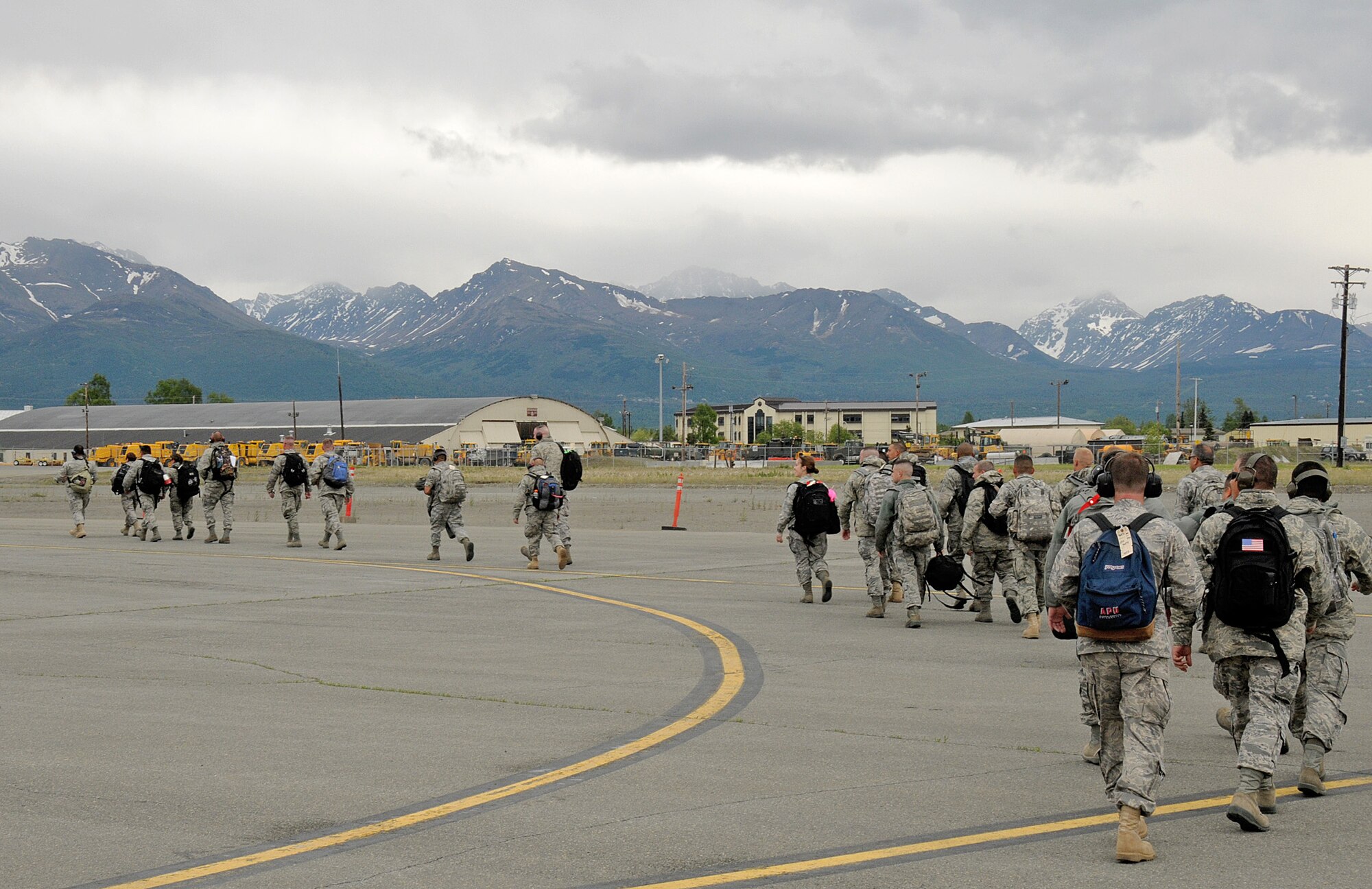 Three squadrons from the 146th Airlift Wing, Channel Islands Air National Guard Station, California, depart for Joint Base Elmendorf-Richardson, Anchorage, Alaska on Saturday, June 4, 2011. The Air Terminal Operations Squadron, Logistics Readiness Squadron, and the Security Forces Squadron move down range to complete there respective annual training requirements. (Photo by Tech. Sgt. Alex Koenig)
