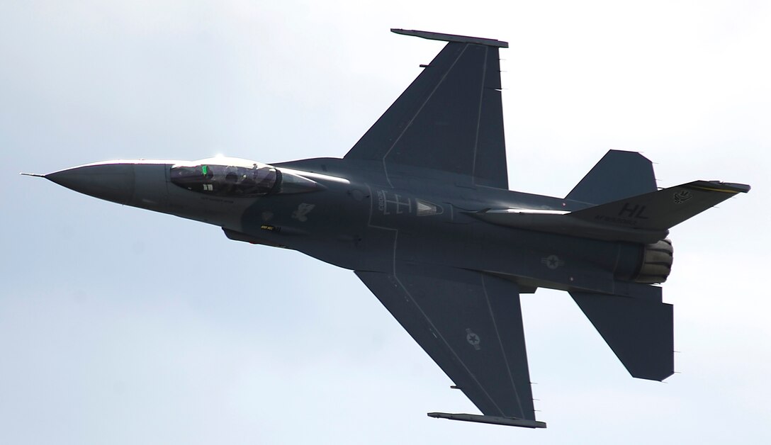 An F-16 Fighting Falcon performs a combat capability demonstration over the 2011 Dakota Thunder airshow at Ellsworth Air Force Base, S.D., June 4, 2011 The F-16 is a multi-role fighter with a range of 2,000 miles unrefueled. (U.S. Air Force photo/Staff Sgt. Marc I. Lane) 