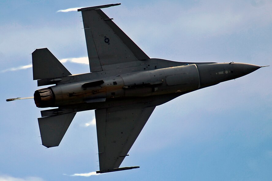 An F-16 Fighting Falcon demonstrates its combat capabilities over the 2011 Dakota Thunder airshow at Ellsworth Air Force Base, S.D., June 4, 2011.  The F-16 is a multi-role fighter with a range of 2,000 miles without refueling. (U.S. Air Force photo/Staff Sgt. Marc I. Lane) 