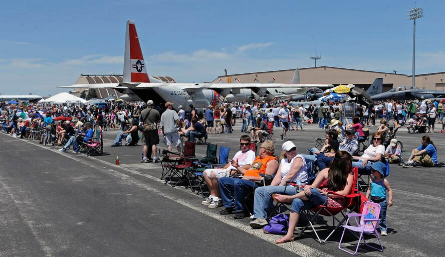 Visitors view multiple static aircraft and aerial demonstrations at the 2011 Dakota Thunder airshow at Ellsworth Air Force Base, S.D., June 4, 2011.  The event drew in nearly 40,000 people. (U.S. Air Force photo/Staff Sgt. Marc I. Lane)