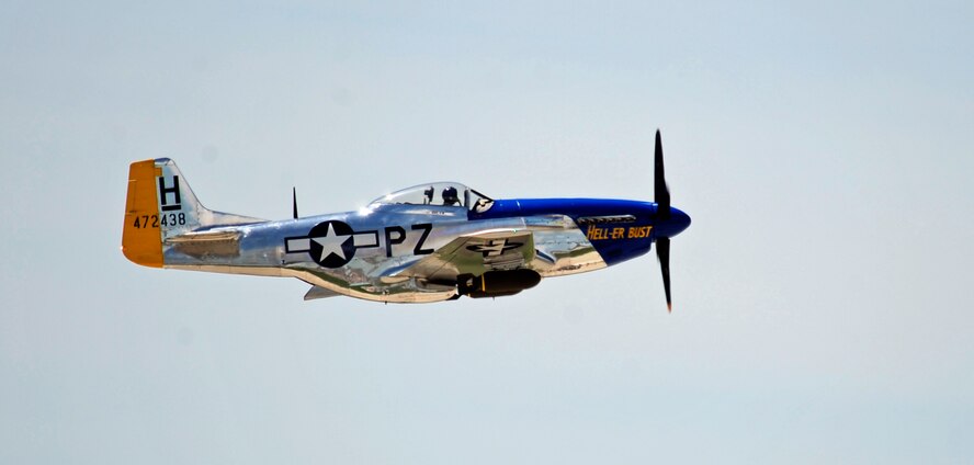 A P-51 Mustang flies during the 2011 Dakota Thunder airshow at Ellsworth Air Force Base, S.D., June 4, 2011. The event drew in nearly 40,000 attendees from the surrounding region. (U.S. Air Force photo/Staff Sgt. Marc I. Lane)