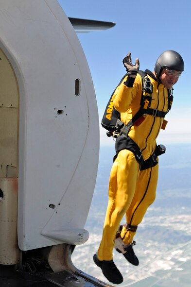 A member of the U.S. Army Golden Knights Parachute Team takes to the air during the 2011 Dakota Thunder airshow at Ellsworth Air Force Base, S.D., June 4, 2011. The Golden Knights have consistently performed well at international parachuting competitions. (U.S. Air Force photo/Staff Sgt. Marc I. Lane)