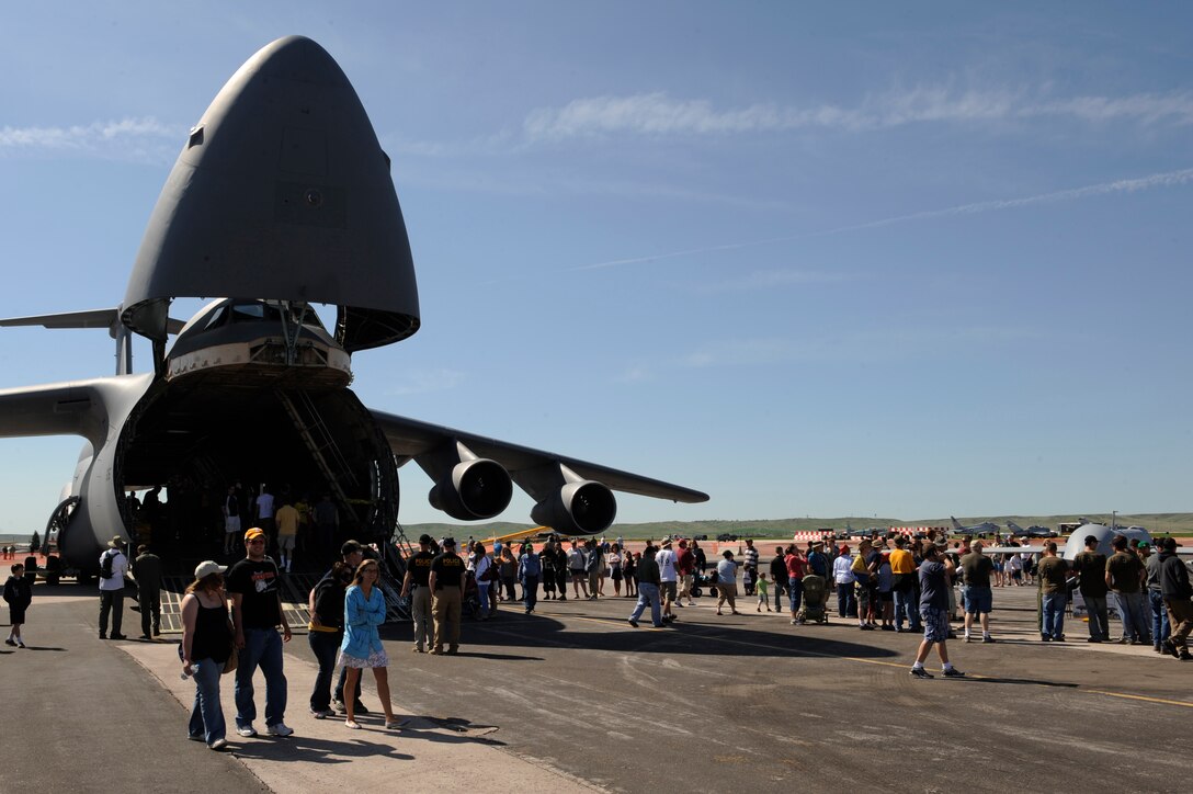 Visitors view multiple static aircraft and aerial demonstrations at the 2011 Dakota Thunder airshow at Ellsworth Air Force Base, S.D., June 4, 2011.  The event drew in nearly 40,000 people. (U.S. Air Force photo/Staff Sgt. Marc I. Lane)