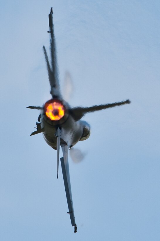 An F-16 Fighting Falcon from the Air Combat Command Viper West Demonstration Team performs during the 2011 Dakota Thunder airshow at Ellsworth Air Force Base, S.D., June 4, 2011. Nearly 40,000 people of all ages and walks of life converged here to watch the vast array of aerial demonstrations and view numerous static aircraft. (U.S. Air Force photo/Tech. Sgt. Nathan Gallahan)