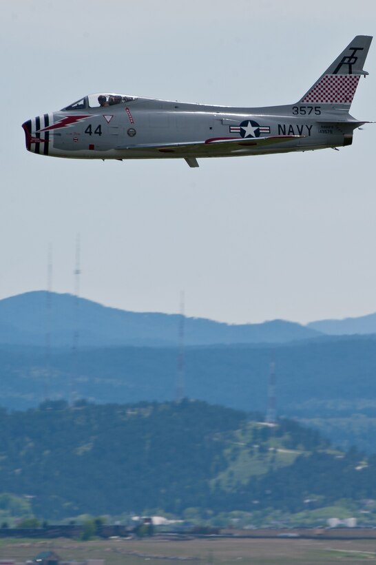 A MiG Fury Fighter performs during the 2011 Dakota Thunder airshow at Ellsworth Air Force Base, S.D., June 4, 2011. Nearly 40,000 people of all ages and walks of life converged here to watch the vast array of aerial demonstrations and view numerous static aircraft. (U.S. Air Force photo/Tech. Sgt. Nathan Gallahan)