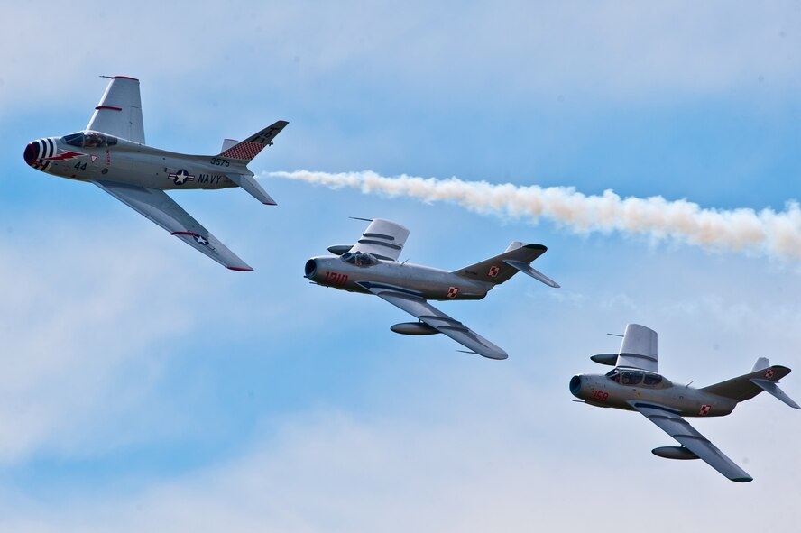 The MiG Fury Fighters Demonstration Team performs during the 2011 Dakota Thunder airshow at Ellsworth Air Force Base, S.D., June 4, 2011. Nearly 40,000 people of all ages and walks of life converged here to watch the vast array of aerial demonstrations and view numerous static aircraft. (U.S. Air Force photo/Tech. Sgt. Nathan Gallahan)