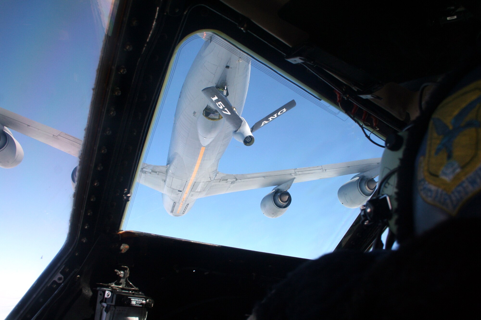 A KC-135R Stratotanker from the 157th Air Refueling Wing of the New Hampshire Air National Guard at Pease Air National Guard Base, N.H., prepares to refuel a C-5M Super Galaxy from Dover Air Force Base, Del., over northern Canada on June 5, 2011. The C-5M's mission was to complete the first Arctic overflight from Dover AFB to Bagram Airfield, Afghanistan. The plane successfully landed at Bagram just over 15 hours after take-off on June 6, 2011. (U.S. Air Force Photo/Master Sgt. Scott T. Sturkol)