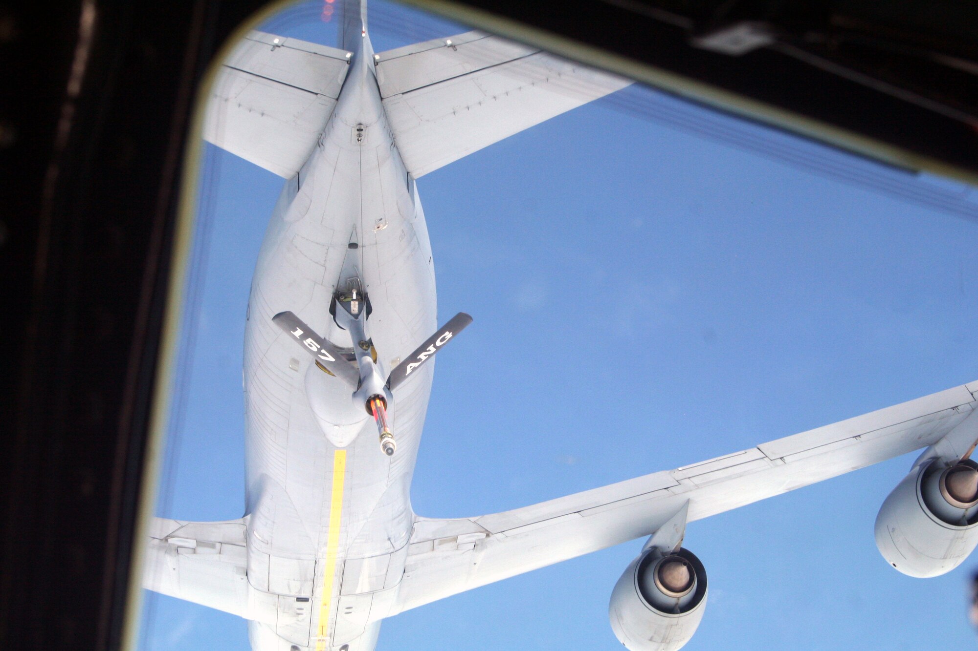 A KC-135R Stratotanker from the 157th Air Refueling Wing of the New Hampshire Air National Guard at Pease Air National Guard Base, N.H., prepares to refuel a C-5M Super Galaxy from Dover Air Force Base, Del., over northern Canada on June 5, 2011. The C-5M's mission was to complete the first Arctic overflight from Dover AFB to Bagram Airfield, Afghanistan. The plane successfully landed at Bagram just over 15 hours after take-off on June 6, 2011. (U.S. Air Force Photo/Master Sgt. Scott T. Sturkol)