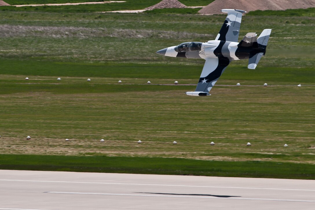 An L-39 Albatros from the Heavy Metal Jet Demonstration Team performs during the 2011 Dakota Thunder airshow at Ellsworth Air Force Base, S.D., June 4, 2011. Nearly 40,000 people of all ages and walks of life converged here to watch the vast array of aerial demonstrations and view numerous static aircraft. (U.S. Air Force photo/Tech. Sgt. Nathan Gallahan)