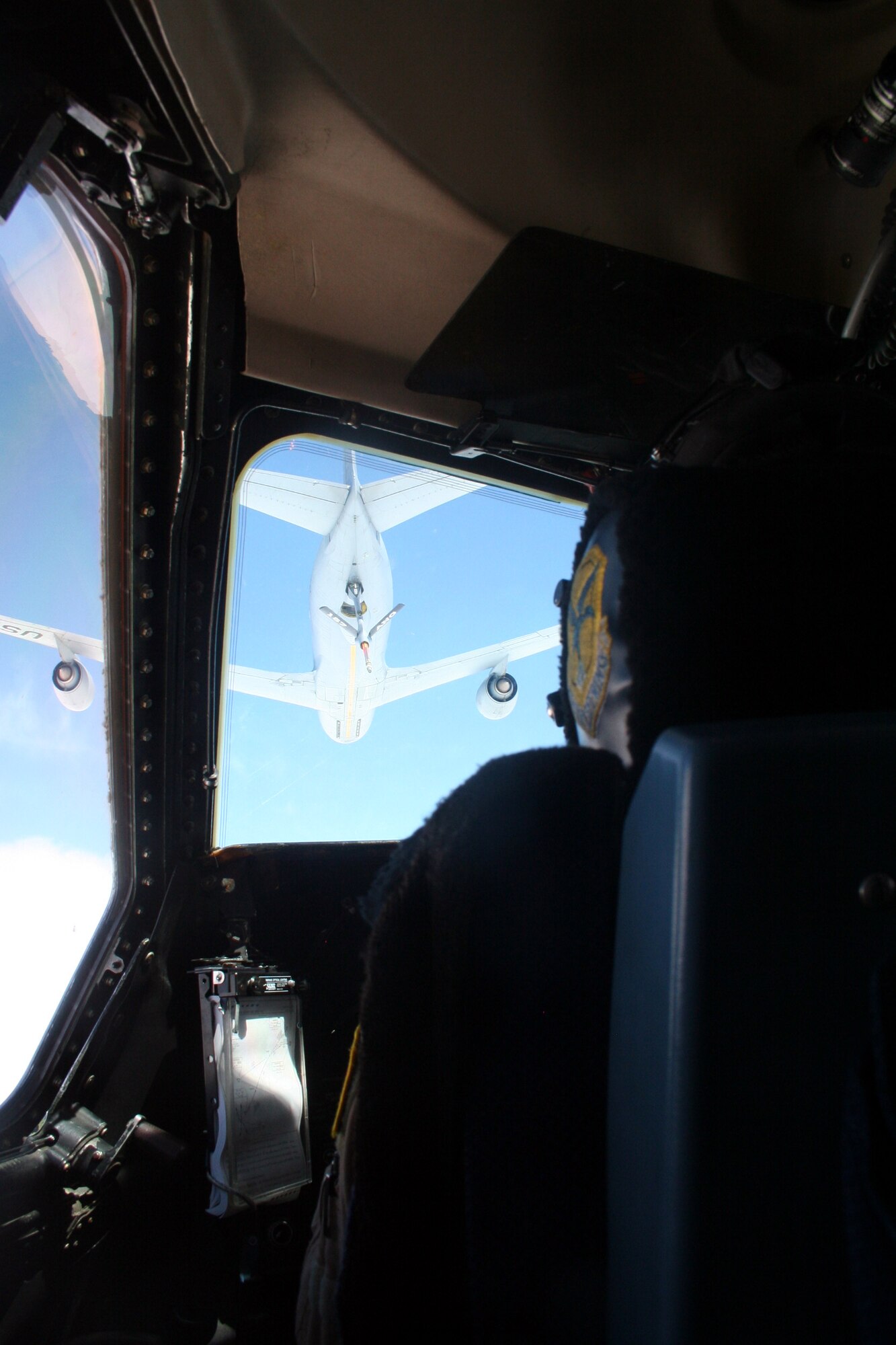 A KC-135R Stratotanker from the 157th Air Refueling Wing of the New Hampshire Air National Guard at Pease Air National Guard Base, N.H., prepares  to refuel a C-5M Super Galaxy from Dover Air Force Base, Del., over northern Canada on June 5, 2011. The C-5M's mission was to complete the first Arctic overflight from Dover AFB to Bagram Airfield, Afghanistan. The plane successfully landed at Bagram just over 15 hours after take-off on June 6, 2011. (U.S. Air Force Photo/Master Sgt. Scott T. Sturkol)