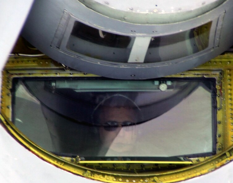 Master Sgt. Sam Blackwell, boom operator, flies in a KC-135R Stratotanker from the 157th Air Refueling Wing of the New Hampshire Air National Guard at Pease Air National Guard Base, N.H., while refueling a C-5M Super Galaxy from Dover Air Force Base, Del., over northern Canada on June 5, 2011. The C-5M's mission was to complete the first Arctic overflight from Dover AFB to Bagram Airfield, Afghanistan. The plane successfully landed at Bagram just over 15 hours after take-off on June 6, 2011. (U.S. Air Force Photo/Master Sgt. Scott T. Sturkol)
