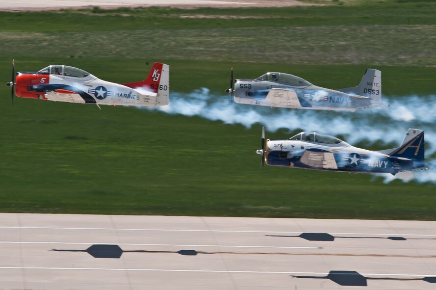 The Trojan Horsemen take off prior during their performance at the 2011 Dakota Thunder airshow at Ellsworth Air Force Base, S.D., June 4, 2011. Nearly 40,000 people of all ages and walks of life converged here to watch the vast array of aerial demonstrations and view numerous static aircraft. (U.S. Air Force photo/Tech. Sgt. Nathan Gallahan)