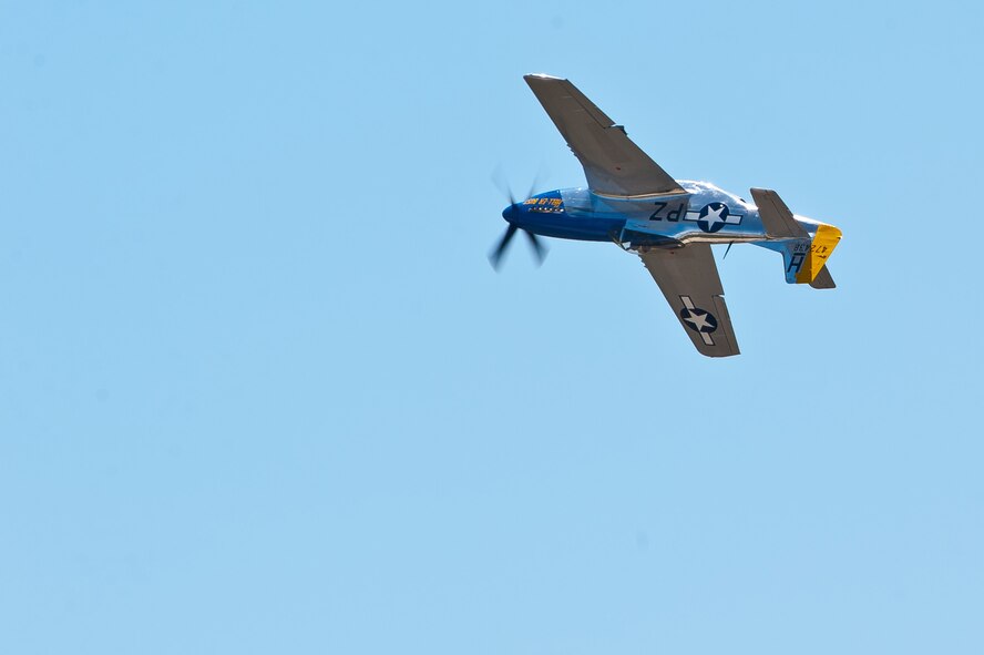 A P-51 Mustang performs during the 2011 Dakota Thunder airshow at Ellsworth Air Force Base, S.D., June 4, 2011. Nearly 40,000 people of all ages and walks of life converged here to watch the vast array of aerial demonstrations and view numerous static aircraft. (U.S. Air Force photo/Tech. Sgt. Nathan Gallahan)