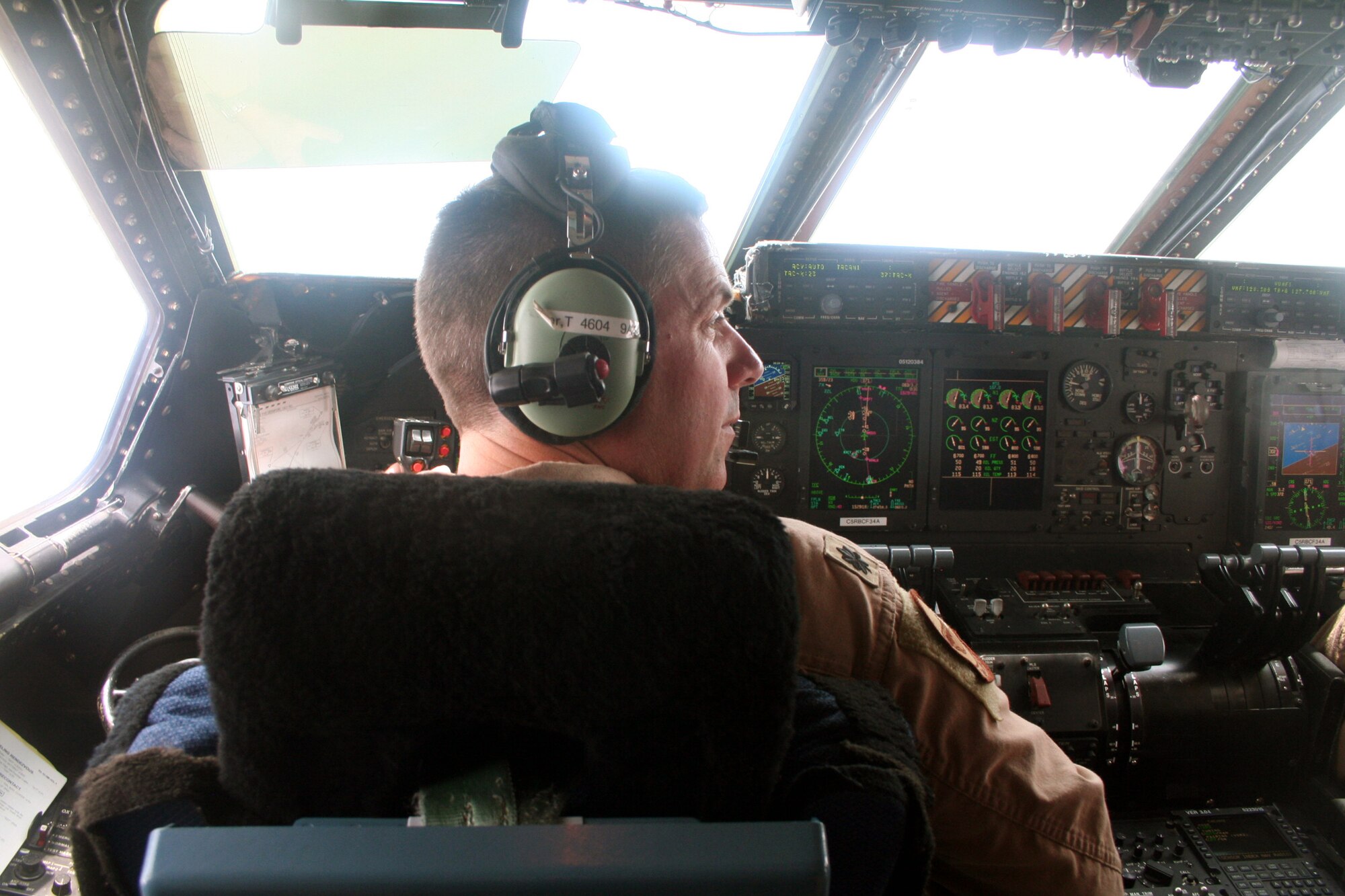 Lt. Col. Thomas Loper, C-5M Super Galaxy pilot, flies a  C-5M on a  mission from Dover Air Force Base, Del., on June 5, 2011. The C-5M's mission was to complete the first Arctic overflight from Dover AFB to Bagram Airfield, Afghanistan. The plane successfully landed at Bagram just over 15 hours later on June 6, 2011. (U.S. Air Force Photo/Master Sgt. Scott T. Sturkol)