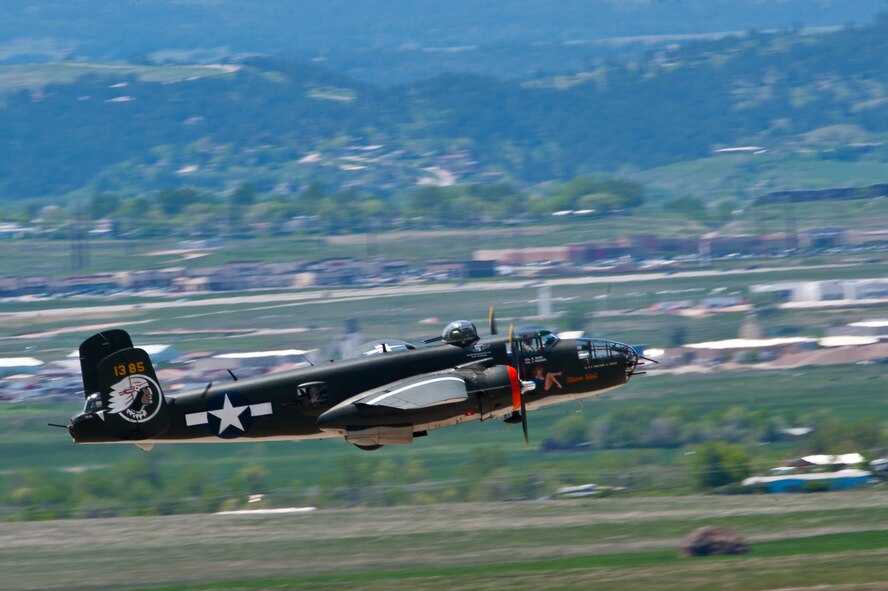 A B-25 Mitchell performs during the 2011 Dakota Thunder airshow at Ellsworth Air Force Base, S.D., June 4, 2011. Nearly 40,000 people of all ages and walks of life converged here to watch the vast array of aerial demonstrations and view numerous static aircraft. (U.S. Air Force photo/Tech. Sgt. Nathan Gallahan)
