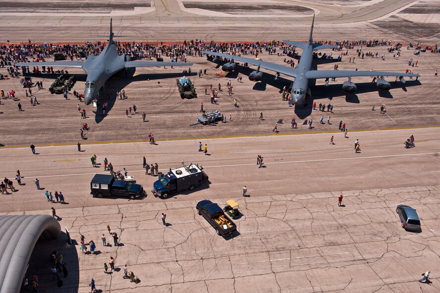 Attendees of the 2011 Dakota Thunder airshow meander amongst static displays at Ellsworth Air Force Base, S.D., June 4, 2011. Nearly 40,000 people of all ages and walks of life converged here to watch the vast array of aerial demonstrations and view numerous static aircraft. (U.S. Air Force photo/Tech. Sgt. Nathan Gallahan)