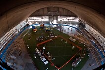 People file through the Pride Hangar at Ellsworth Air Force Base, S.D., June 4, 2011 to visit the 2011 Dakota Thunder airshow. Nearly 40,000 people of all ages and walks of life converged here to watch the vast array of aerial demonstrations and view numerous static aircraft. (U.S. Air Force photo/Tech. Sgt. Nathan Gallahan)
