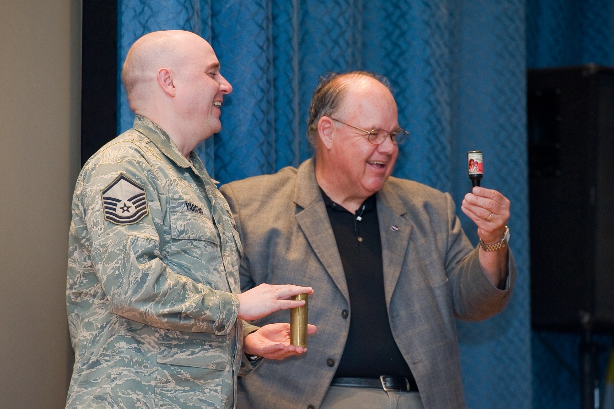 Master Sgt. Christopher Yarcho, 341 Missile Security Forces Squadron Flight
Chief, assists magician John Drebinger Jr. during a wing safety briefing at
the Malmstrom AFB auditorium May 26. (U.S. Air Force Photo / Beau Wade)