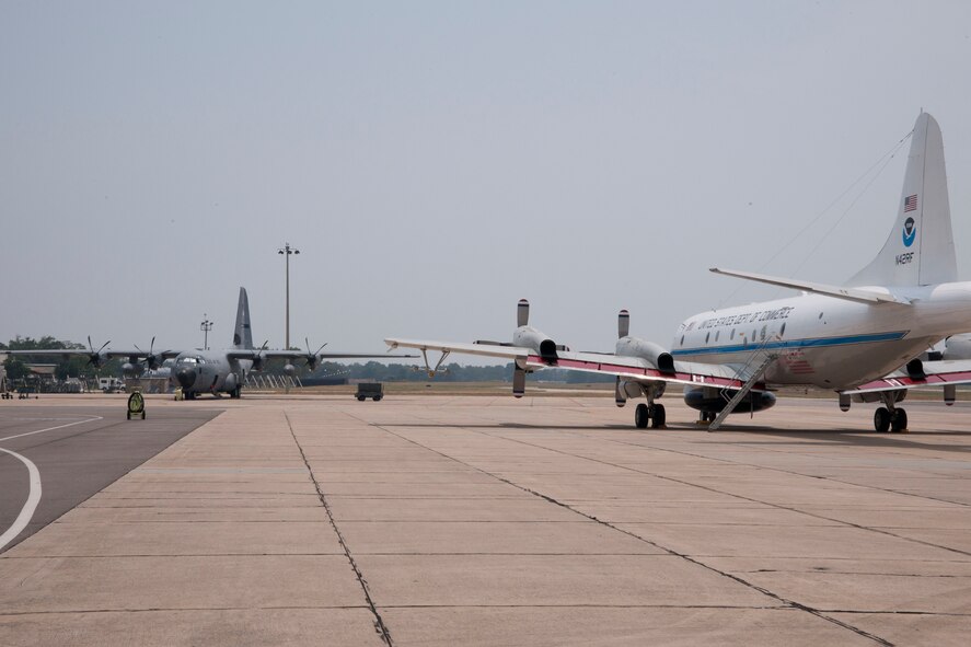 Since 2006 members of the 53rd Weather Reconnaissance Squadron and crewmembers from the National Oceanic Atmospheric Administration have gathered each year to talk over procedures, data systems and storm coordination. This year the meeting was held here at Keesler Air Force Base. NOAA flys the WP-3 Orion turboprop "Hurricane Hunter," shown at right, while the 53rd WRS "Hurricane Hunters" fly the WC-130J. (U.S. Air Force photo by Maj. Heather Newcomb)